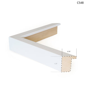 White wooden frame corner with a natural wood interior, showcasing a modern design.