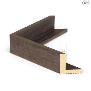 Dark wood picture frame corner with a gold inner edge, angled view.