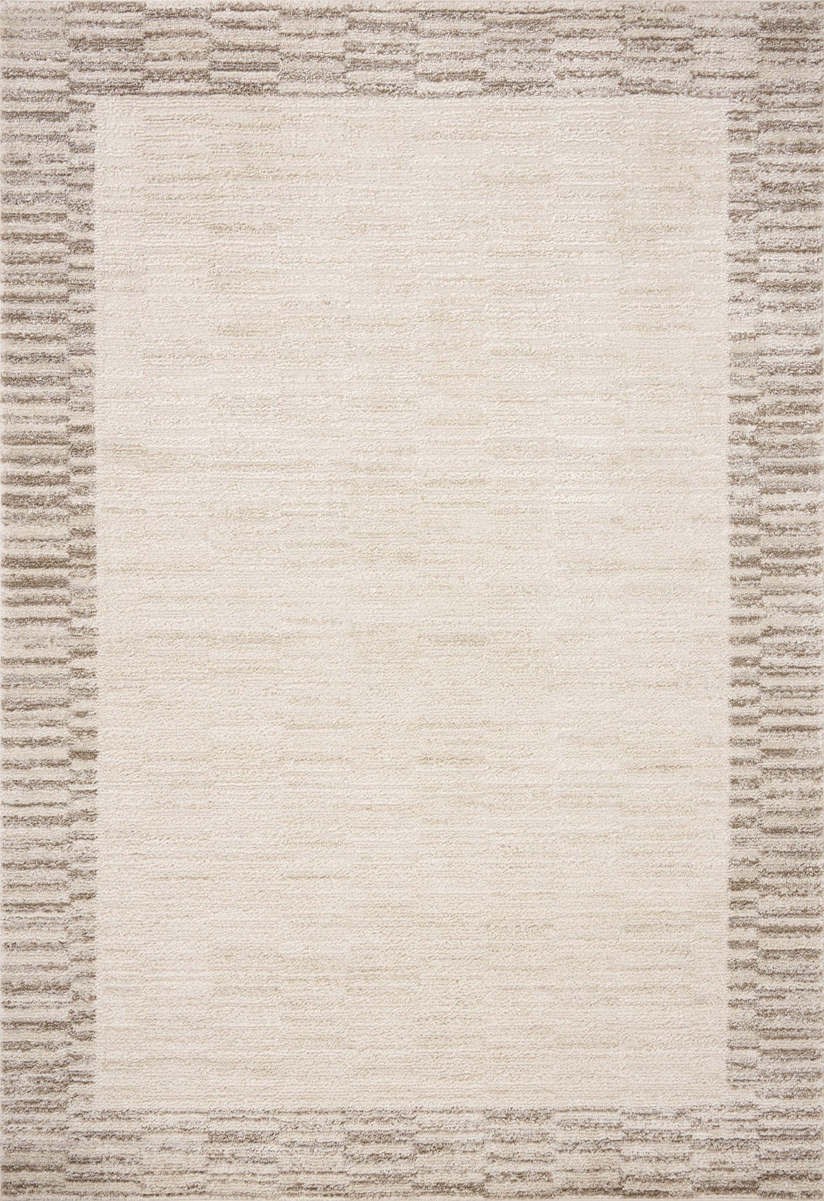 Calvin Ivory / Pebble — a Loloi rug at Laurie Yapp Home.