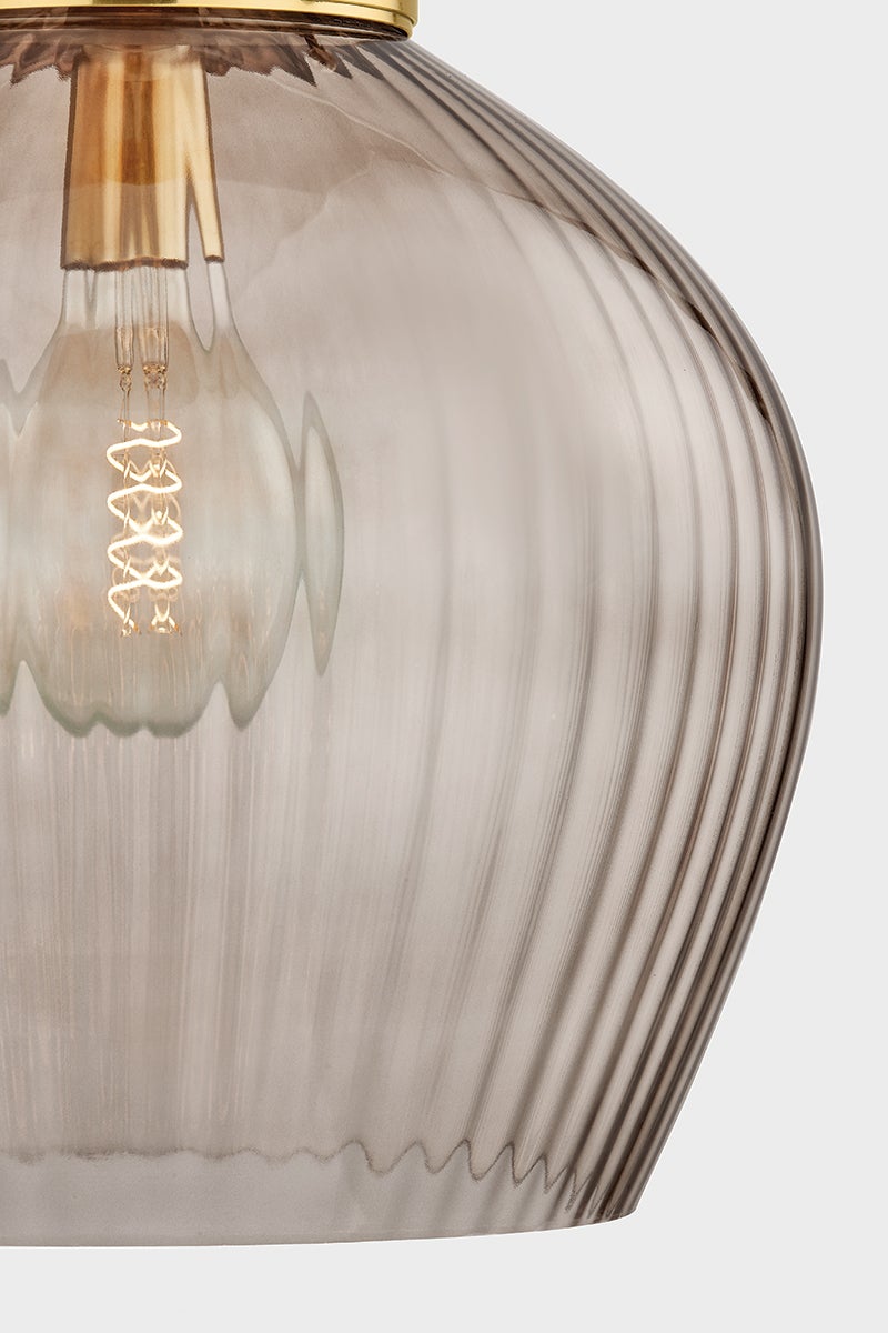 Close-up of the Chatton Pendant 16.5" in aged brass showing the shade shape and metal detail.