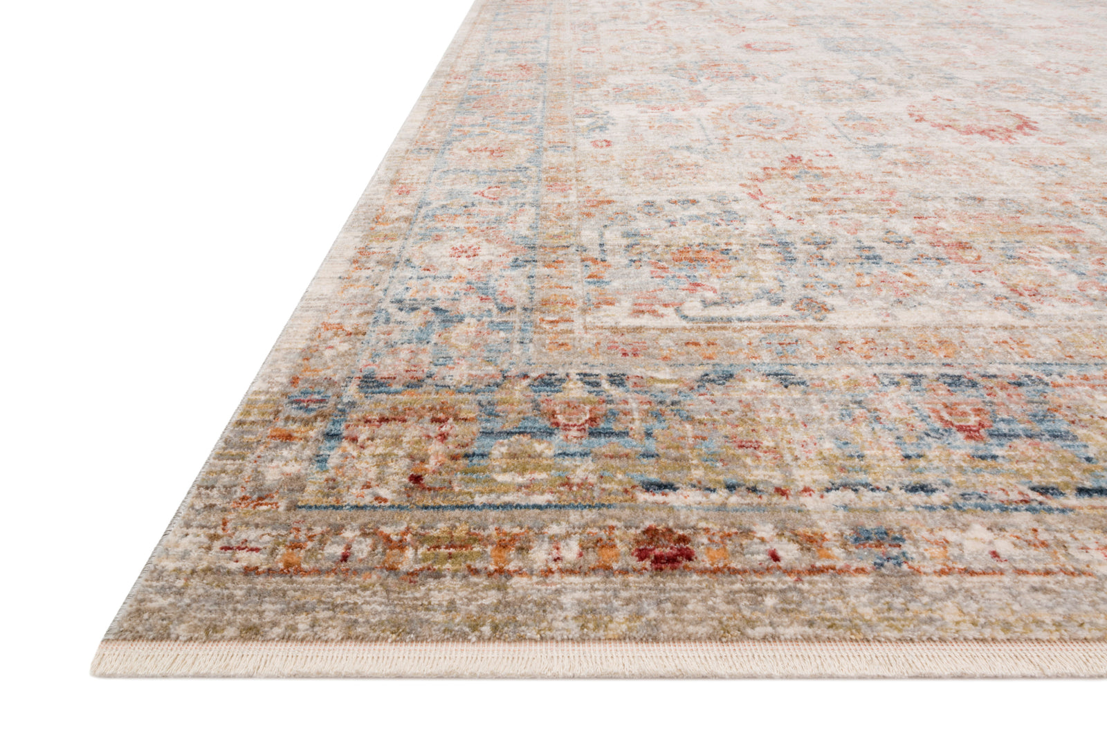 Claire Ivory / Ocean — a Loloi rug at Laurie Yapp Home.