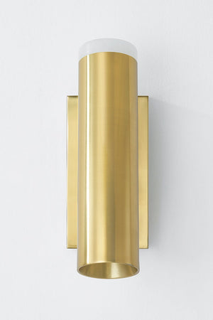 Clark Wall Sconce in aged brass shown from a second angle to highlight the arm curve and shade silhouette.