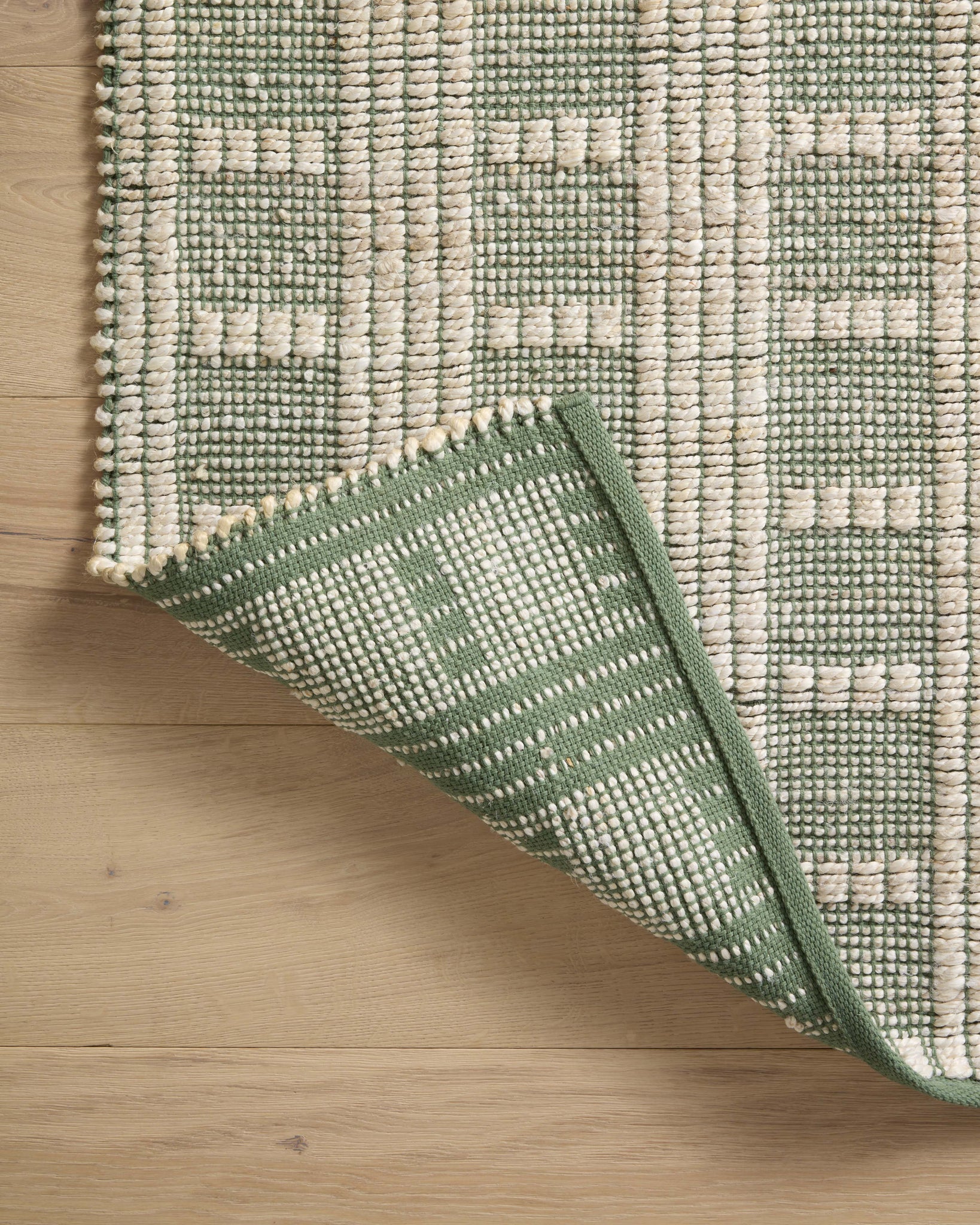 Colton Ivory / Sage shown from a different angle to reveal its pattern.