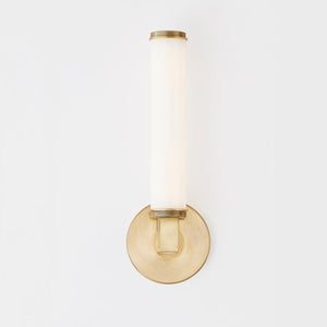 Cromwell Wall Sconce 4.75" x 13.75" in aged brass shown from the front to reveal the arm curve and shade silhouette.