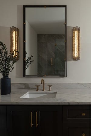 Carnelian Wall Sconce styled in a warmly lit hallway for warm, layered light at Laurie Yapp Home.