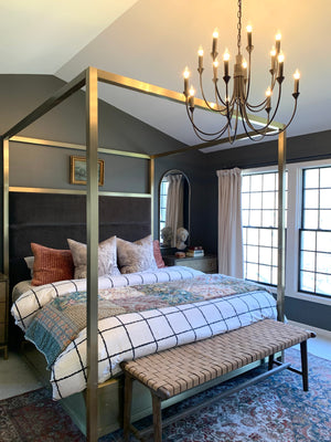 Cate Chandelier 30" styled in an elegant dining room for warm, layered light at Laurie Yapp Home.