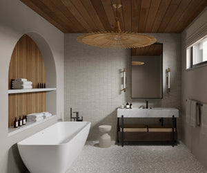 Costa Mesa Pendant 50" styled in a two-story entry for warm, layered light at Laurie Yapp Home.