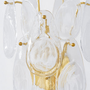 Darcia Wall Sconce in aged brass shown from a second angle to highlight the arm curve and shade silhouette.