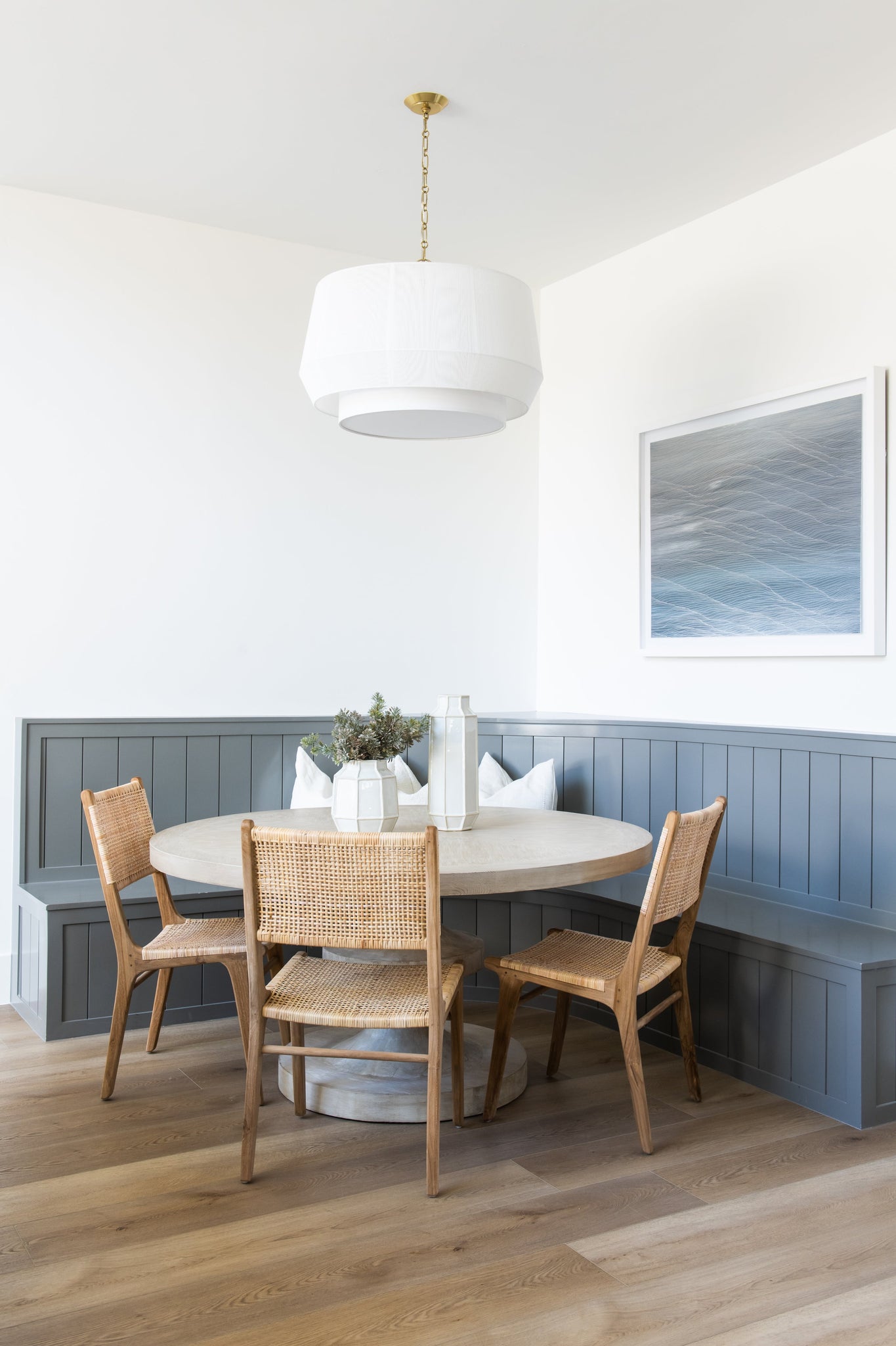 Debi Pendant 30.5" in aged brass styled in a bright kitchen for warm, layered light at Laurie Yapp Home.
