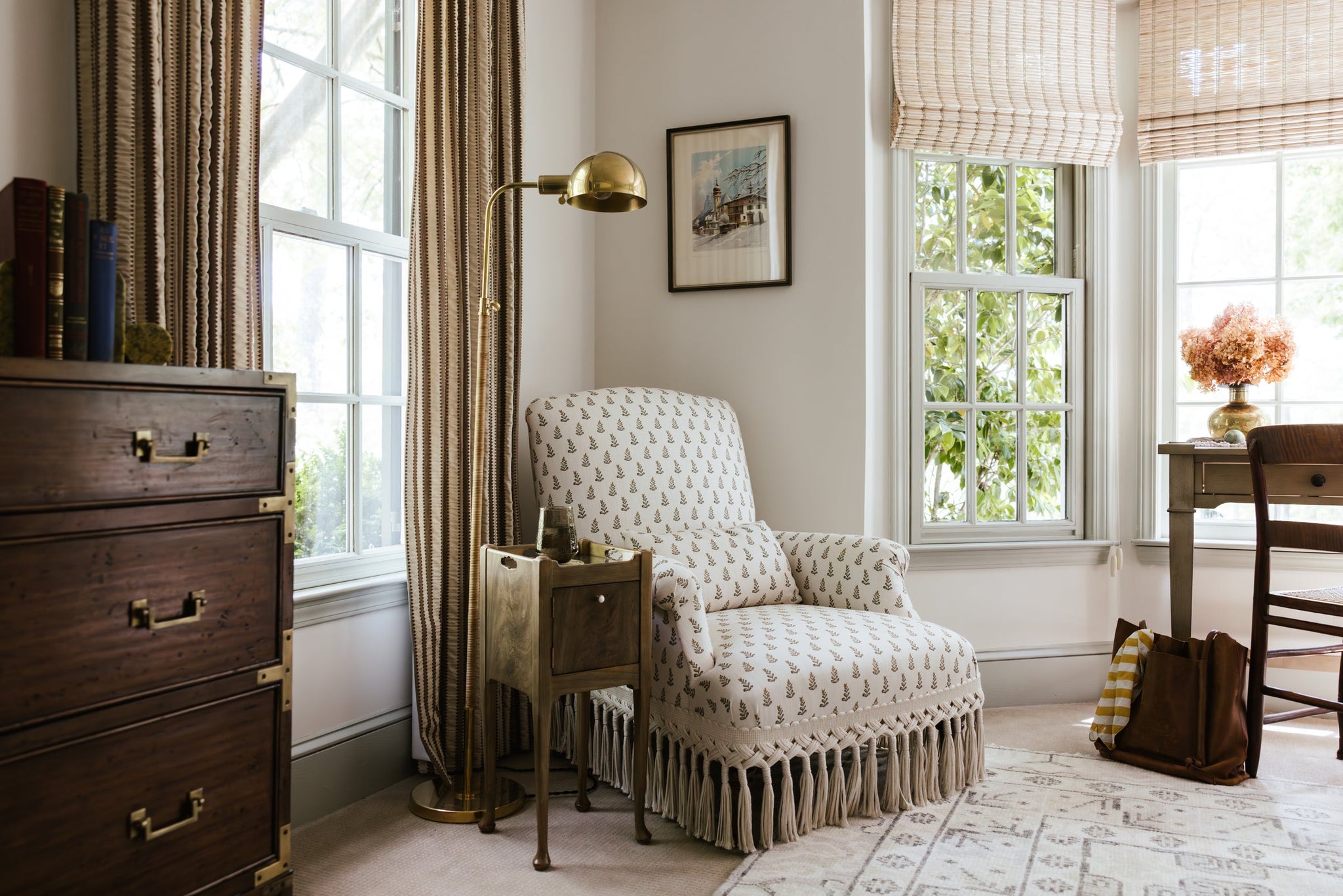 Devon Floor Lamp in aged brass styled in a reading nook for warm, layered light at Laurie Yapp Home.