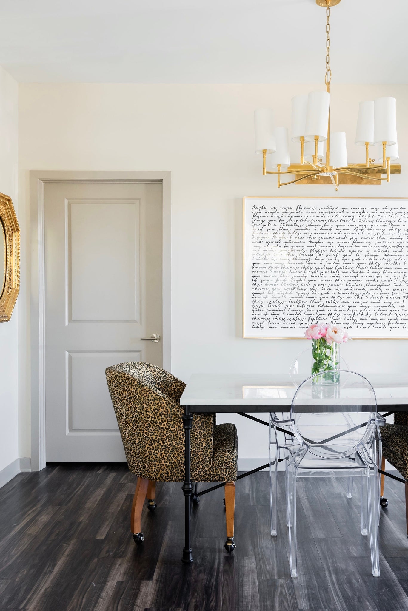 Dillon Chandelier 30" in aged brass styled in an elegant dining room for warm, layered light at Laurie Yapp Home.