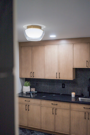 Dutton Flush Mount styled in a hallway for warm, layered light at Laurie Yapp Home.