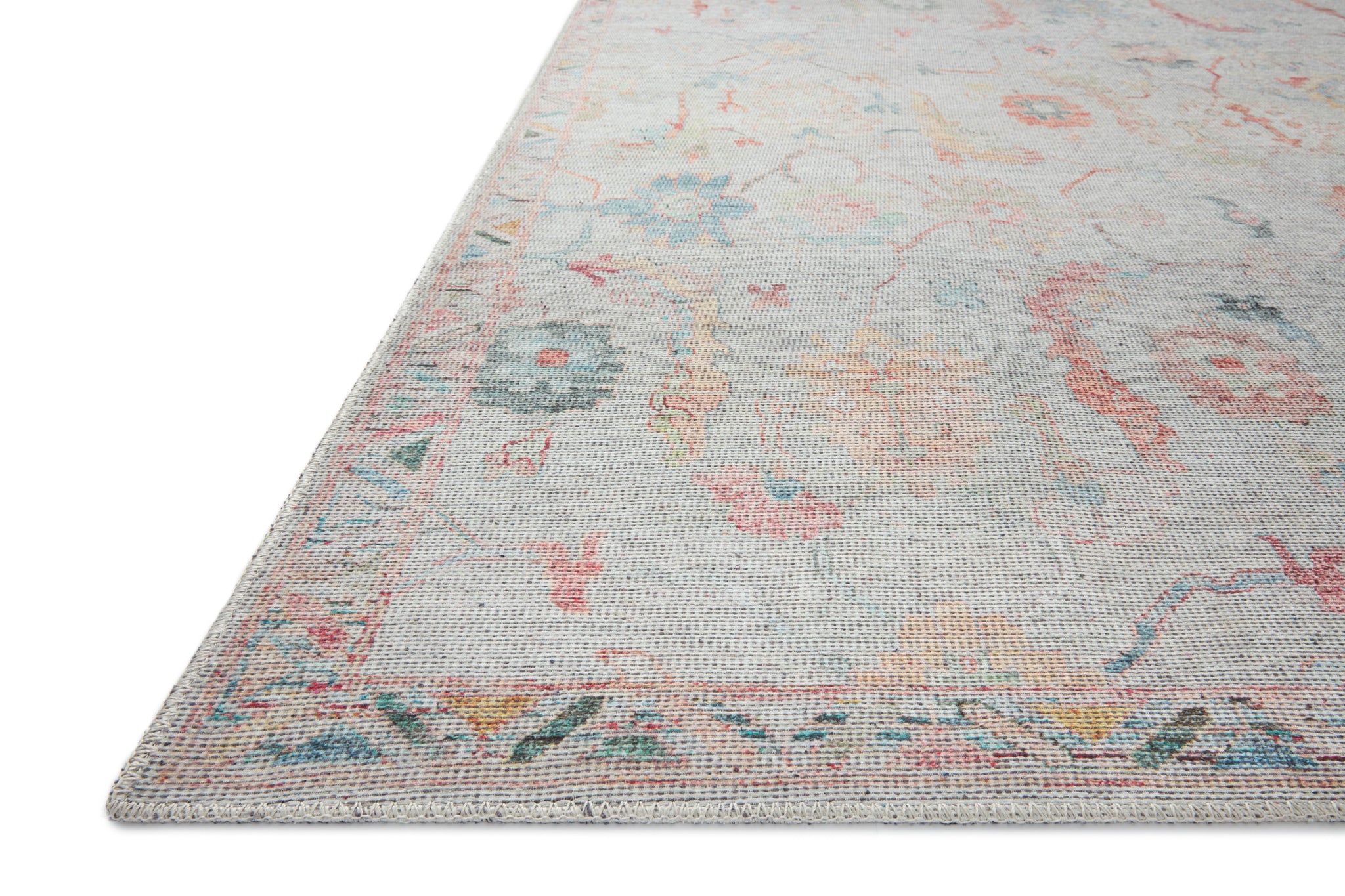 Side view of the Elysium Pebble / Multi rug.