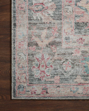 Elysium Graphite / Multi shown in a curated living room setting at Laurie Yapp Home.