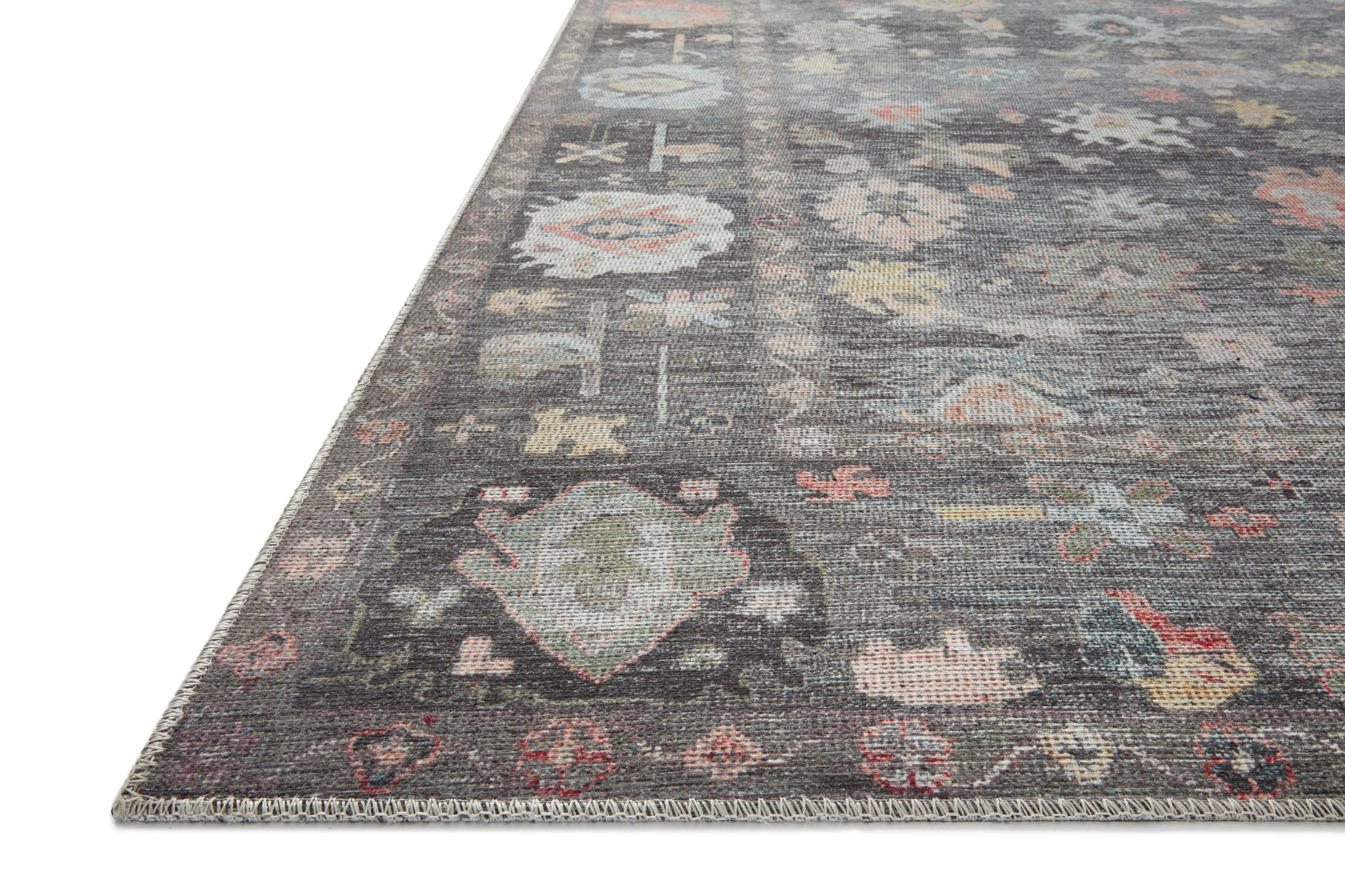 Side view of the Elysium Charcoal / Multi rug.
