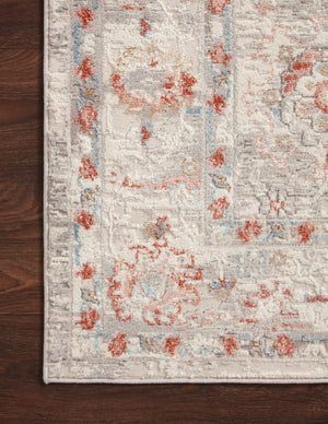 Estelle Ivory / Rust shown in a curated living room setting at Laurie Yapp Home.