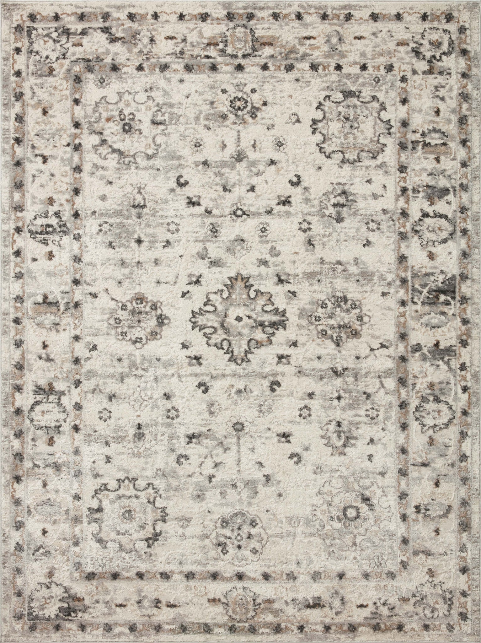 Estelle Ivory / Stone shown in a curated living room setting at Laurie Yapp Home.