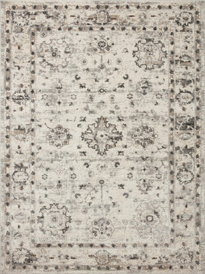 Estelle Ivory / Stone shown in a curated living room setting at Laurie Yapp Home.