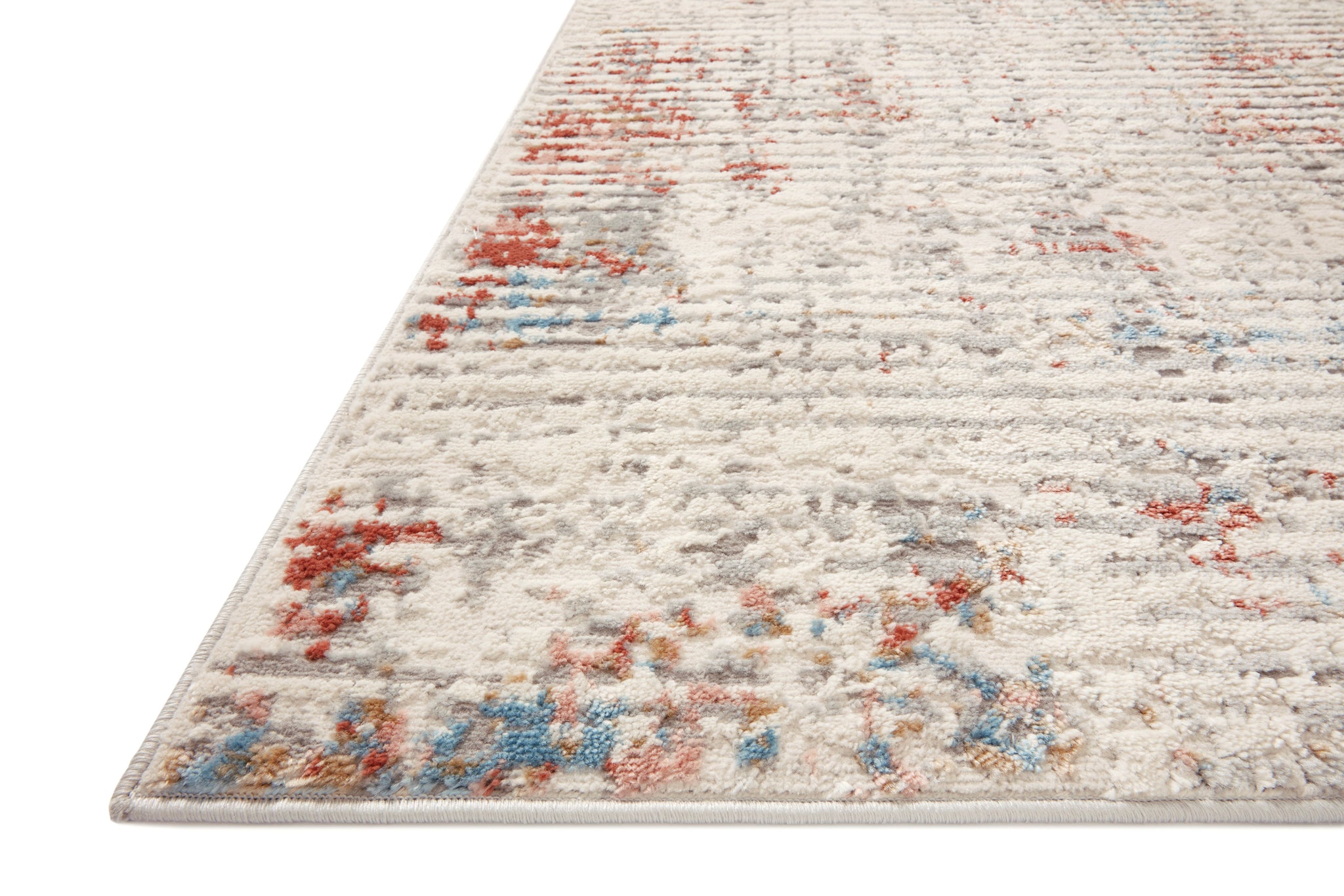 Side view of the Estelle Ivory / Multi rug.