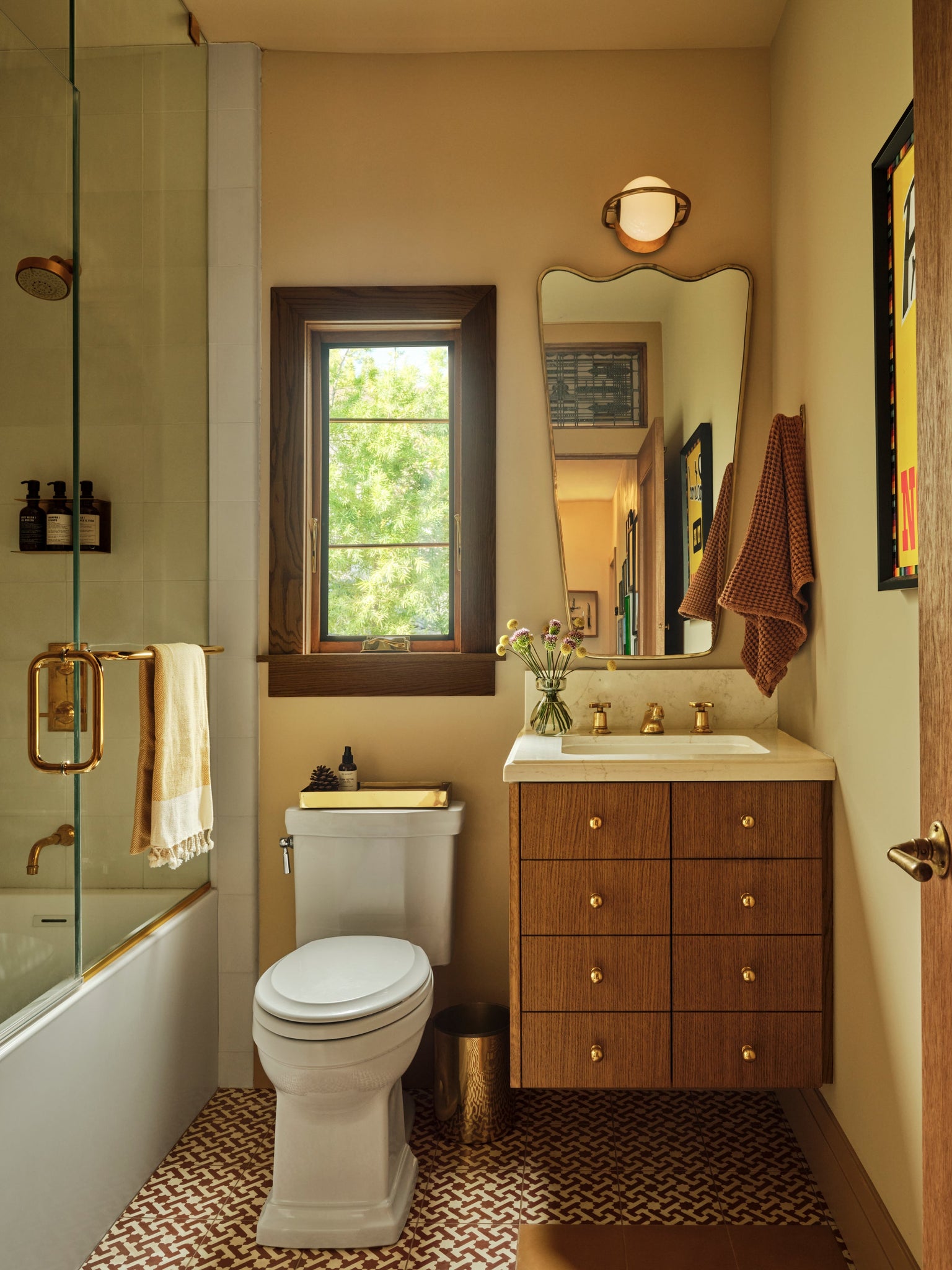 Everley Wall Sconce styled in a curated living room for warm, layered light at Laurie Yapp Home.