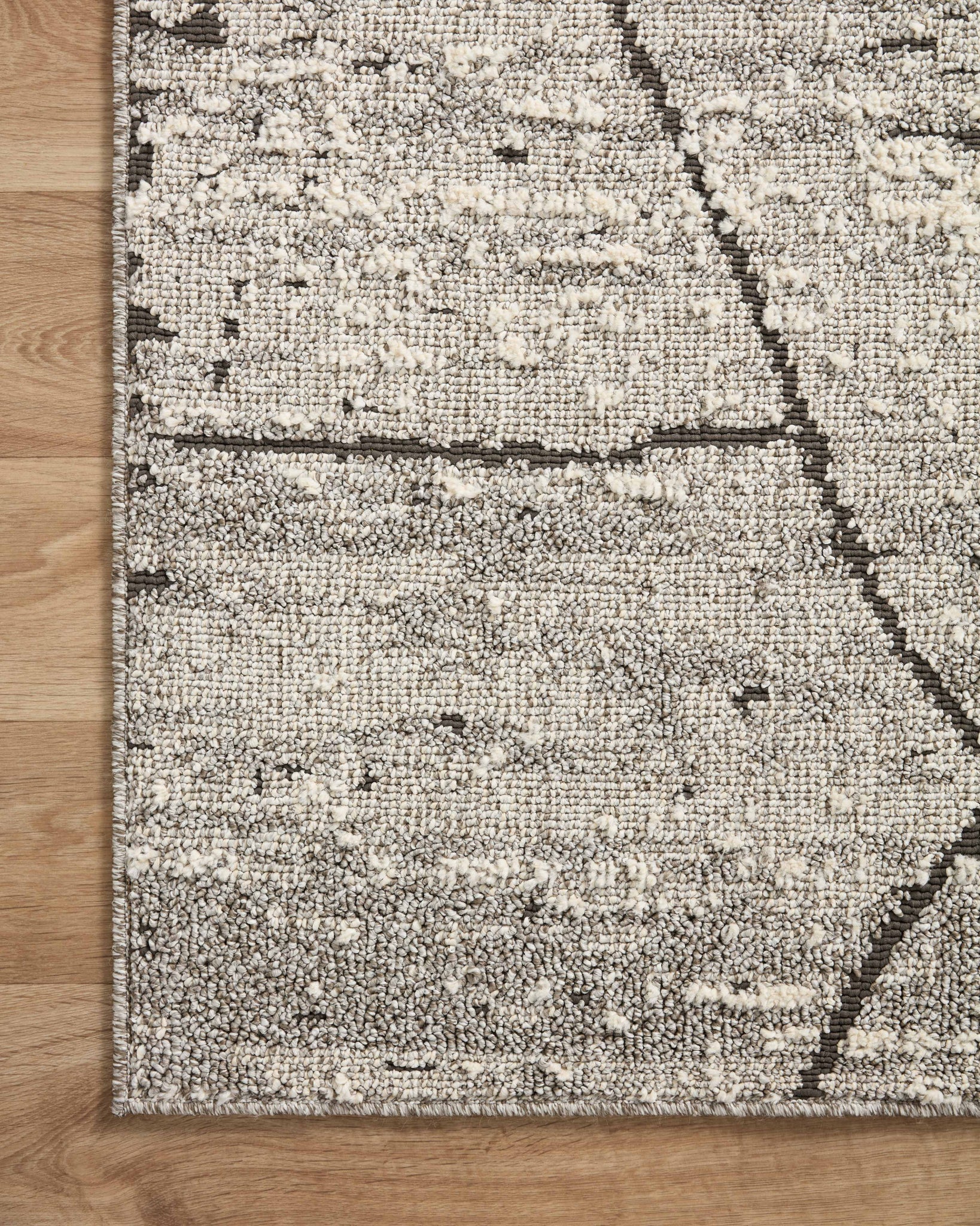 Fabian Grey / Charcoal styled in a living room at Laurie Yapp Home.