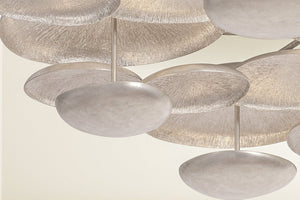 Close-up of the Fistral Semi Flush 58.5" showing the shade profile and mounting canopy.
