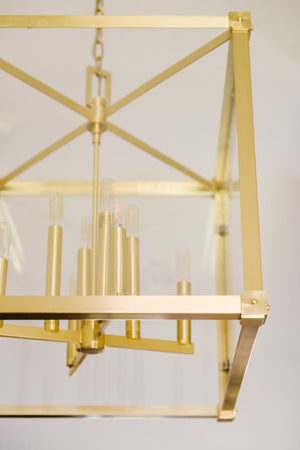 Forsyth Lantern 20.25" in aged brass styled in a foyer for warm, layered light at Laurie Yapp Home.