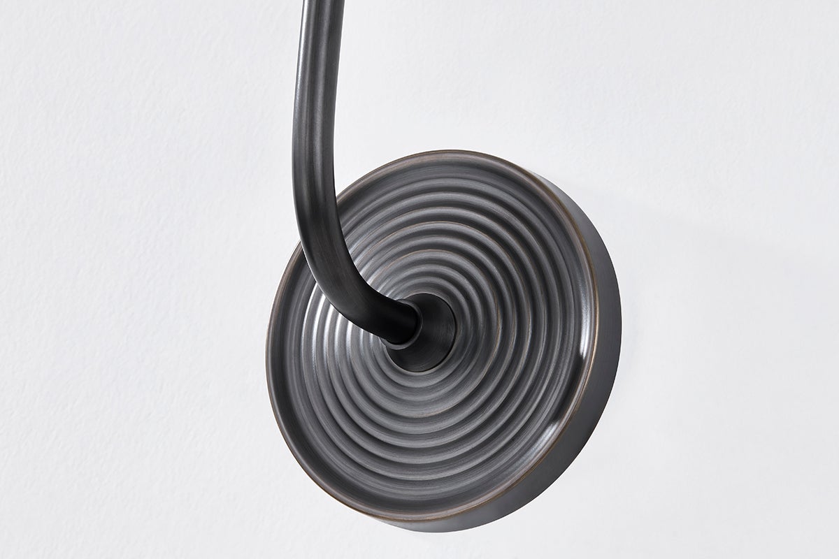 Gladstone Wall Sconce in dark bronze shown from the front to reveal the arm curve and shade silhouette.
