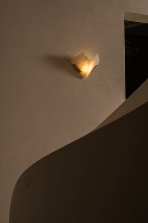 Geo Wall Sconce 13.25" styled in a modern bathroom for warm, layered light at Laurie Yapp Home.