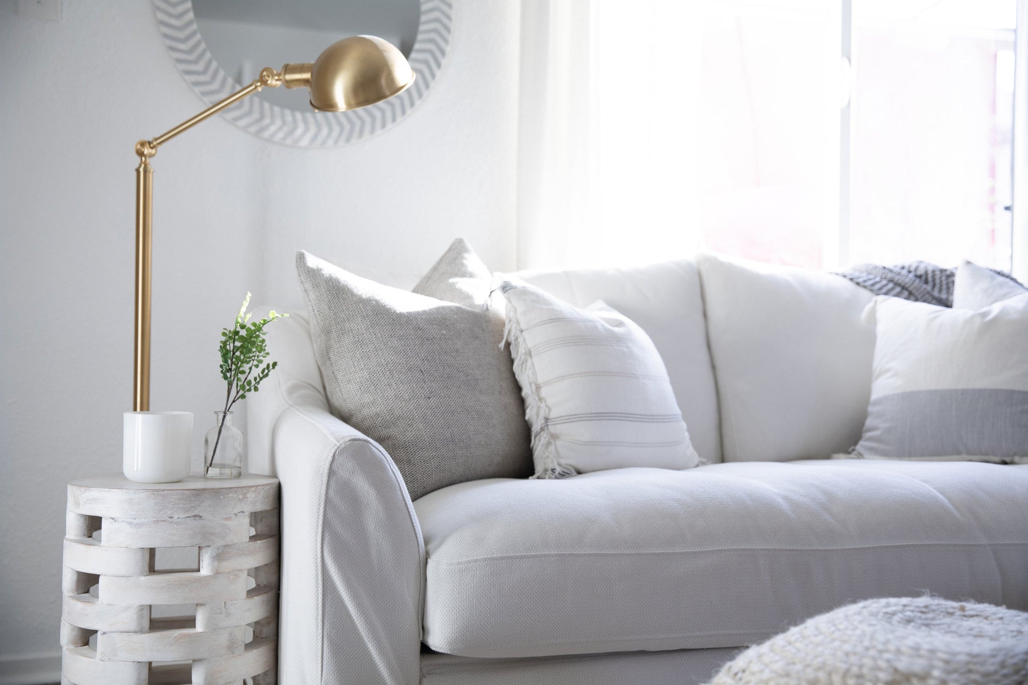 Girard Floor Lamp styled in a bedroom for warm, layered light at Laurie Yapp Home.