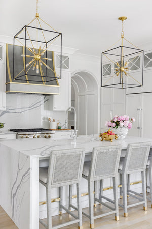 Glendale Lantern 20.25" in aged brass styled in an entry hallway for warm, layered light at Laurie Yapp Home.