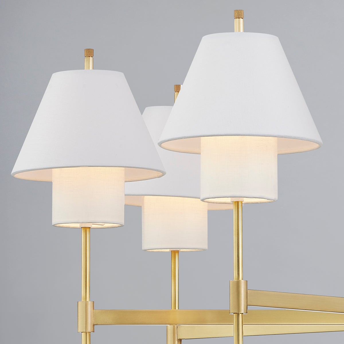 Glenmoore Chandelier 48.5" x 26.25" in aged brass shown from the front to reveal the frame, arms, and shade detail.