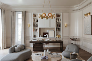 Glimmer Chandelier in aged brass shown from the front to reveal the frame, arms, and shade detail.