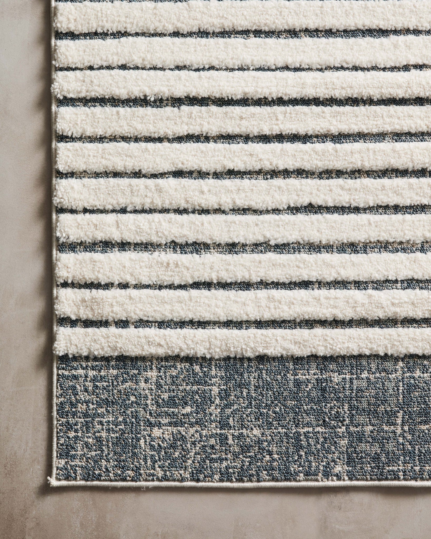 Hagen White / Ocean styled in a living room at Laurie Yapp Home.