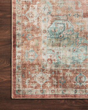Heidi Terracotta / Aqua shown in a curated living room setting at Laurie Yapp Home.