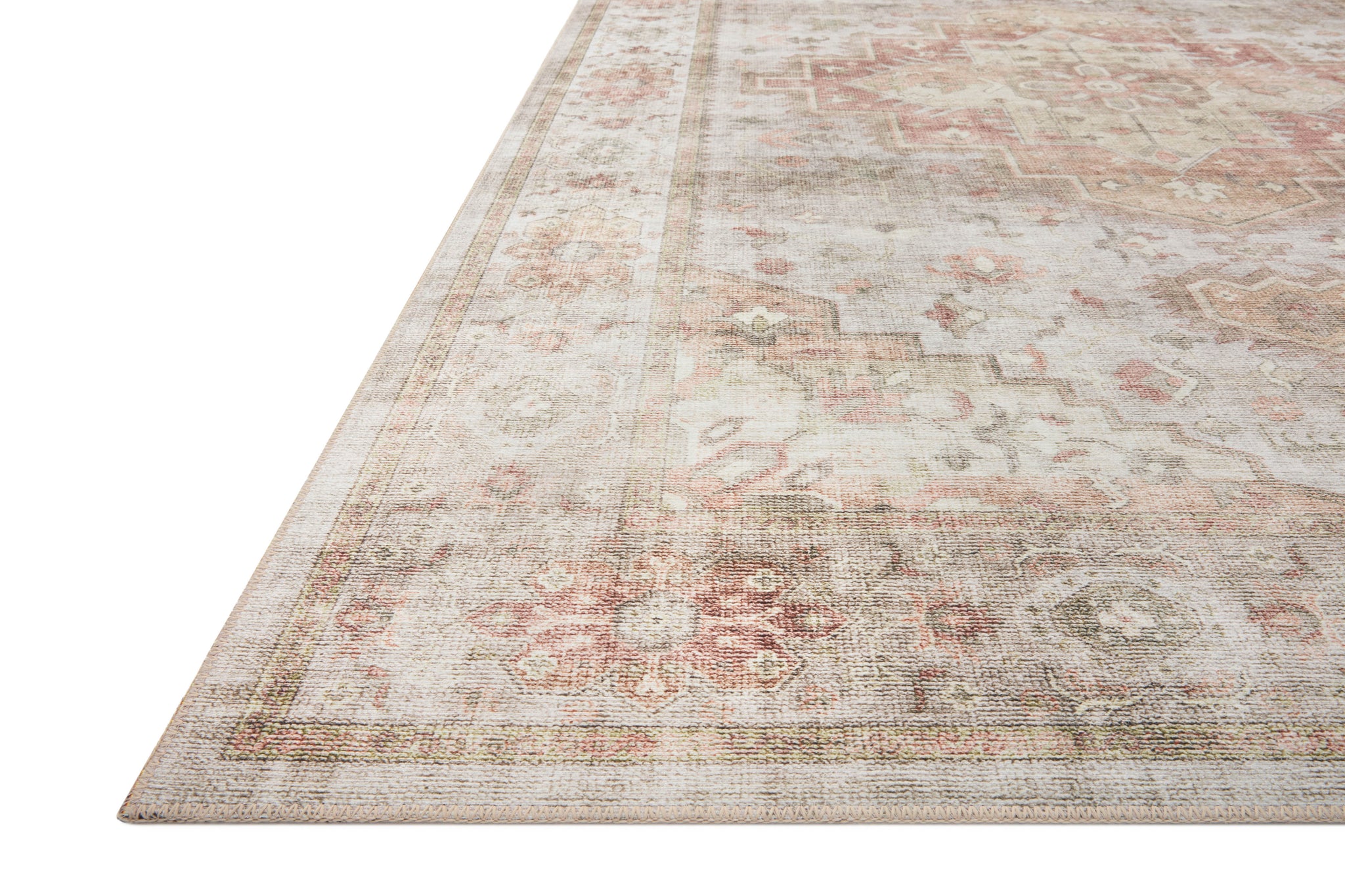 Side view of the Heidi Sage / Multi rug.