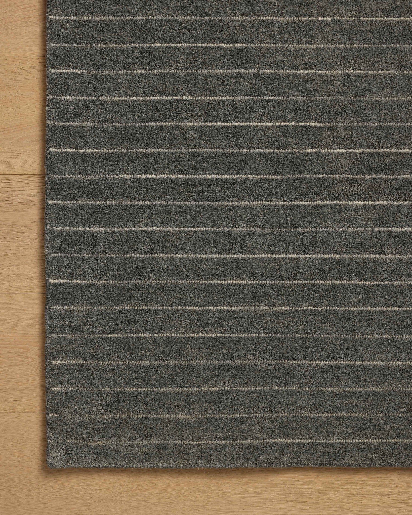 Henry Charcoal / Ivory shown from a different angle to reveal its pattern.