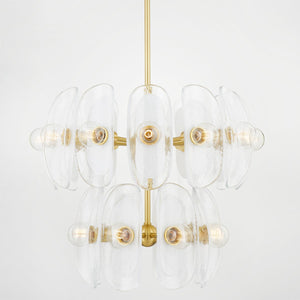 Hilo Chandelier in aged brass shown from a second angle to highlight the frame, arms, and shade detail.