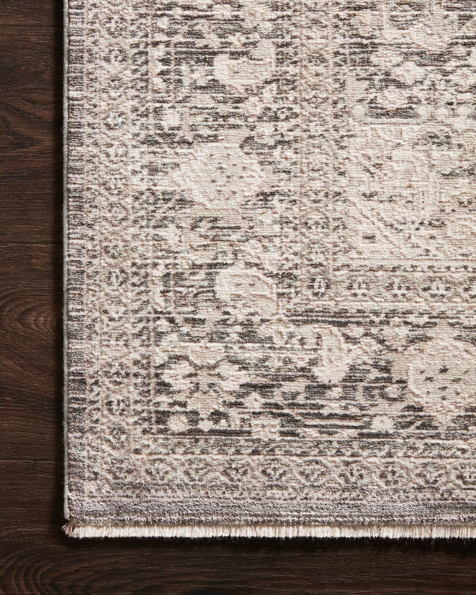 Side view of the Homage Ivory / Grey rug.