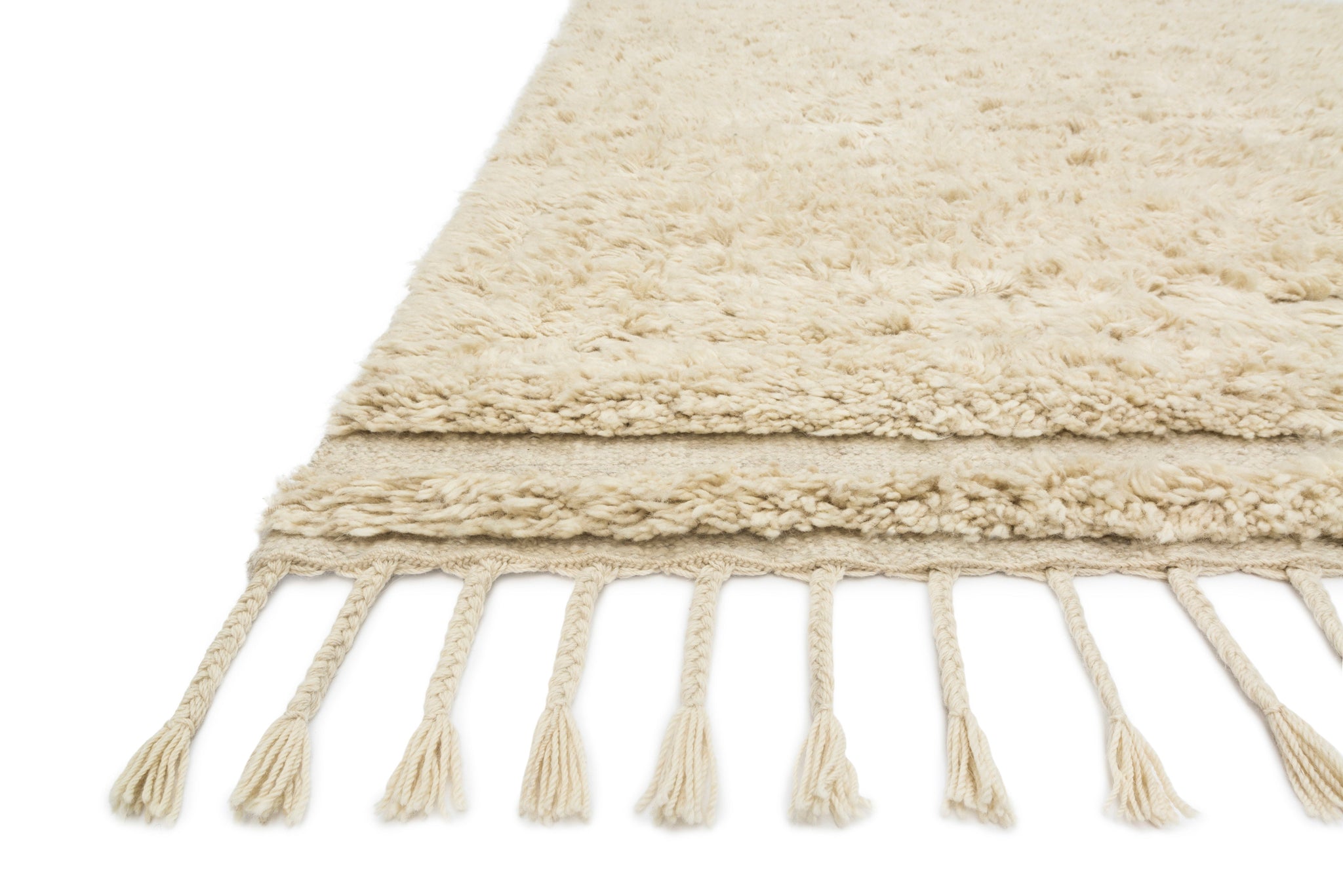 Side view of the Hygge Oatmeal / Sand rug.