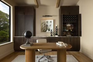 Hampshire Picture Light 23.25" in dark bronze styled in a gallery wall for warm, layered light at Laurie Yapp Home.