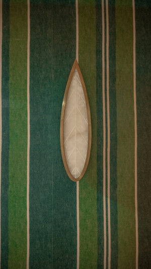 Havasu Wall Sconce styled in a warmly lit hallway for warm, layered light at Laurie Yapp Home.
