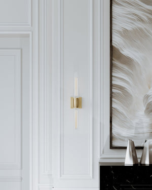 Hogan Wall Sconce 4.5" x 24.5" in aged brass shown from a second angle to highlight the arm curve and shade silhouette.