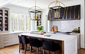 Hollis Lantern 0" in aged brass styled in a covered porch for warm, layered light at Laurie Yapp Home.