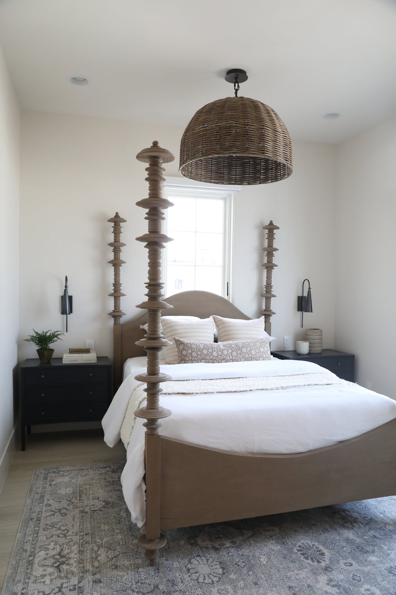 Alva Wall Sconce 4.25" in bronze styled in a curated living room for warm, layered light at Laurie Yapp Home.