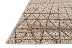 Side view of the Isle Beige / Mocha rug.