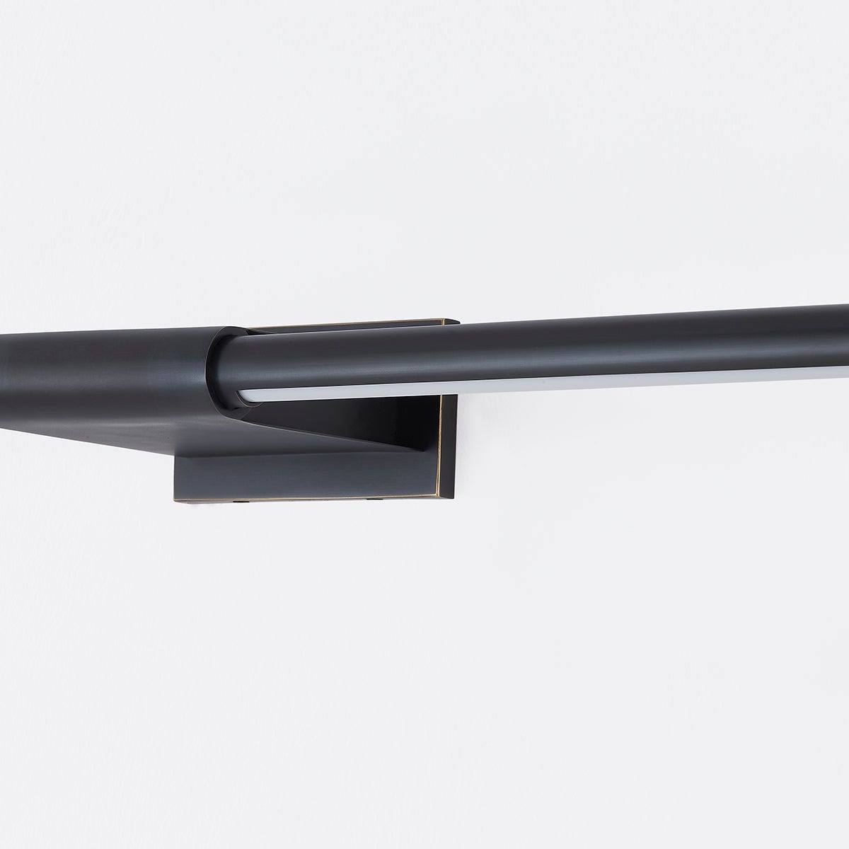 Close-up of the Jerome Picture Light 30" in bronze showing the arm curve and shade proportion.