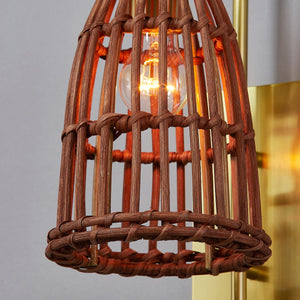 Jordan Wall Sconce in aged brass shown from a second angle to highlight the arm curve and shade silhouette.