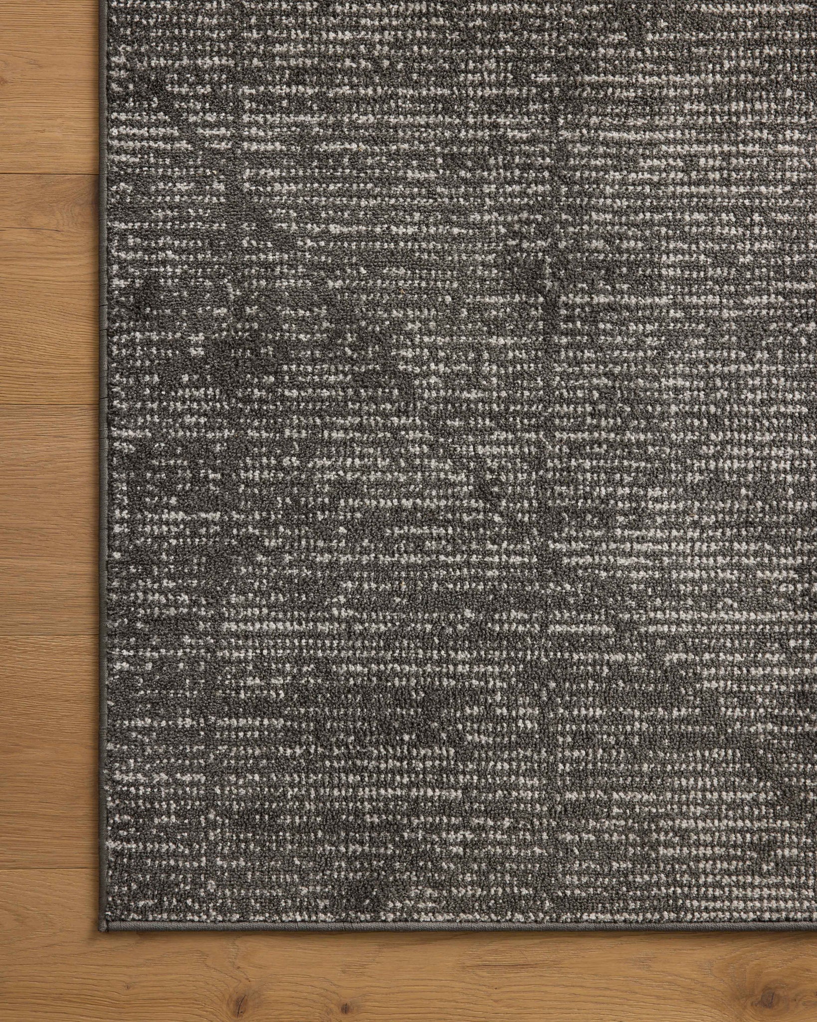 Kamala Charcoal / Ivory shown from a different angle to reveal its pattern.