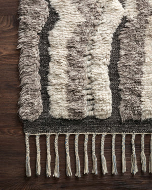 Side view of the Khalid Stone / Charcoal rug.